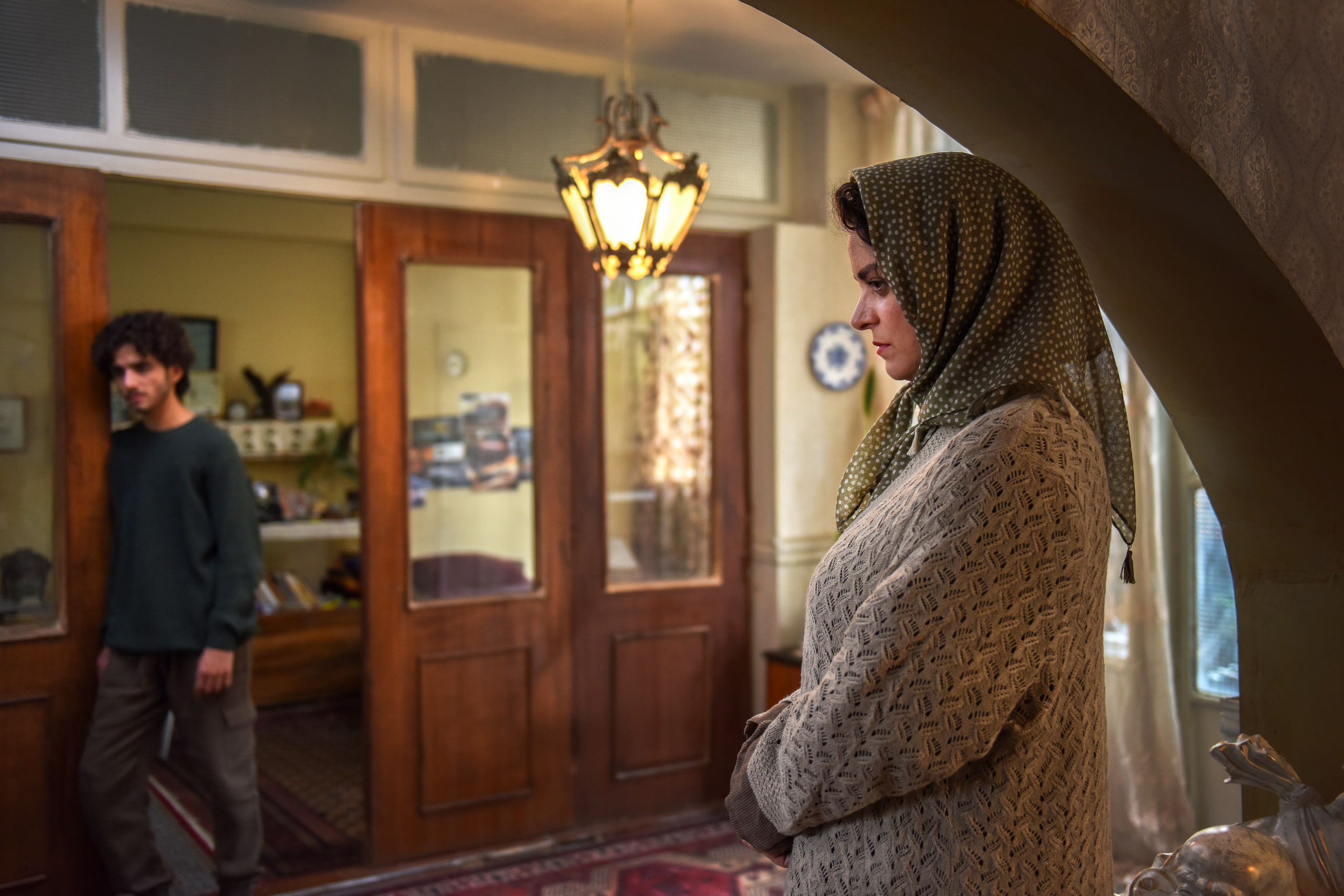 Ghazal Shakeri and son in doorway