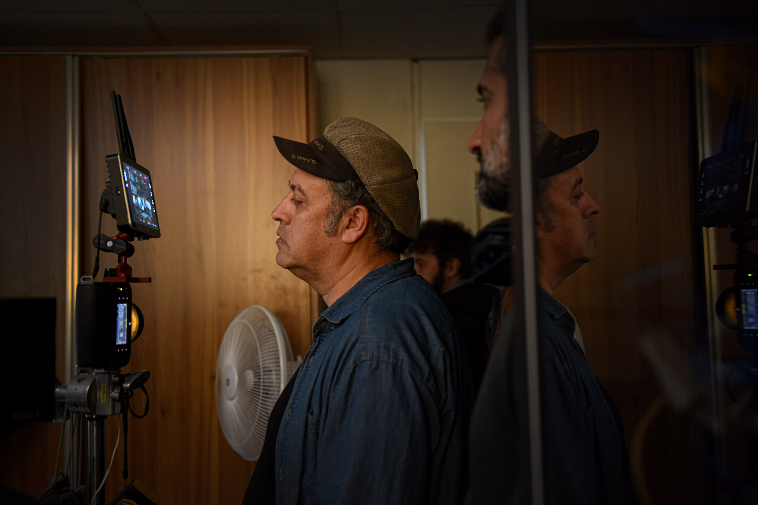Director Hesam Farahmand monitoring the shot