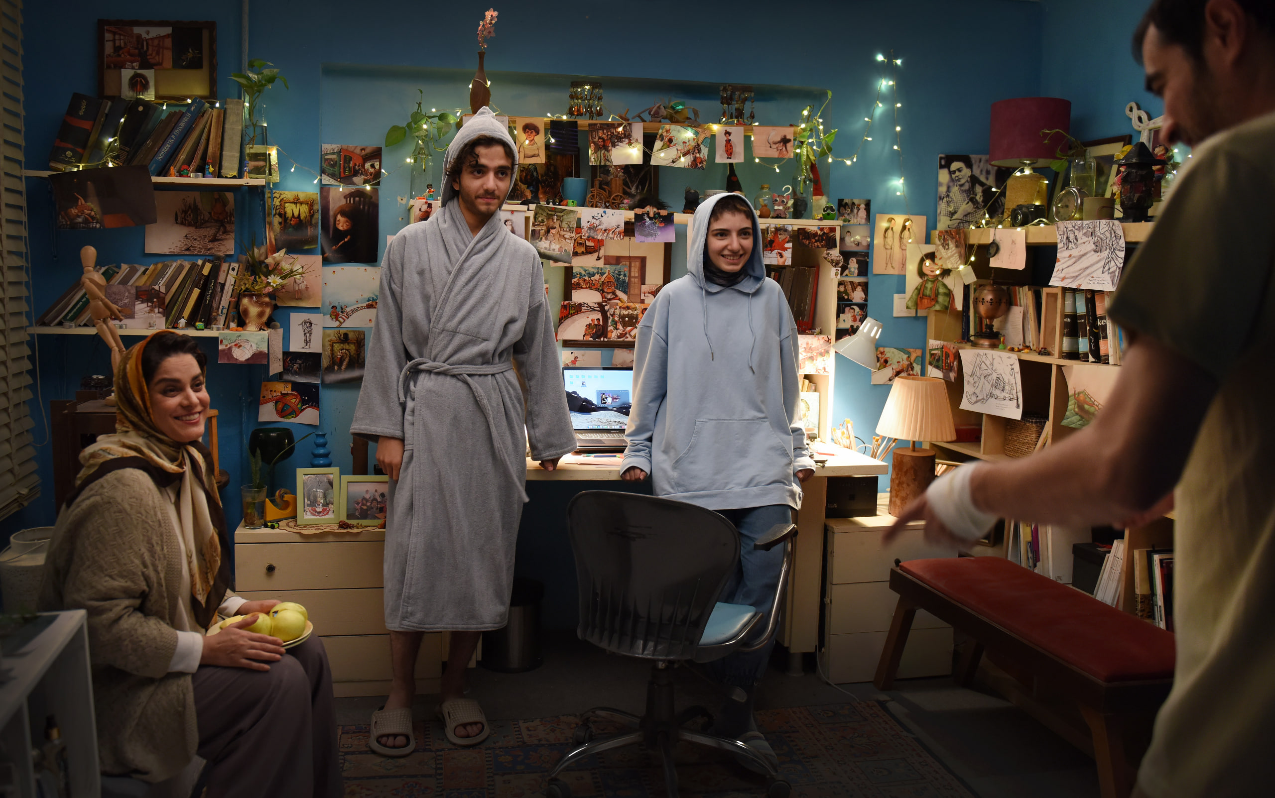 Family gathering in a blue room